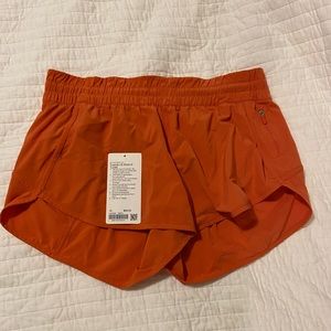 Lululemon Tracker Low Rise 4” Short *lined Size 14 in Warm Coral